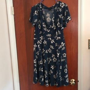 Blue floral wrap dress. This dress is a m/L